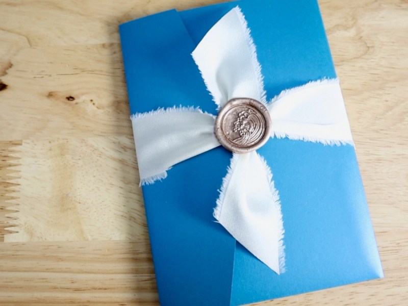 How to Use a Wax Seal and Ribbon on Wedding Invitations | SO&nbsp;Elegant!